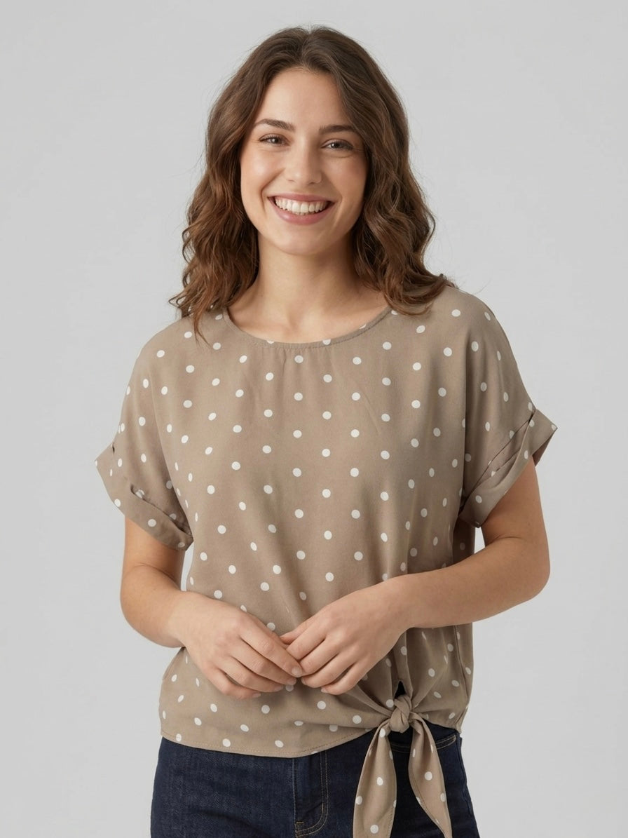 Blusa a pois con fiocco frontale tortora